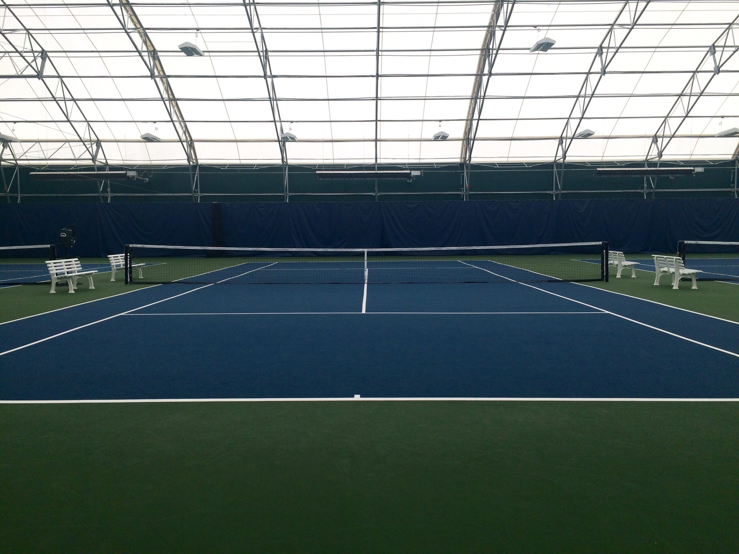 indoor-tennis-court-at-a-sports-complex-2025-01-16-12-09-29-utc