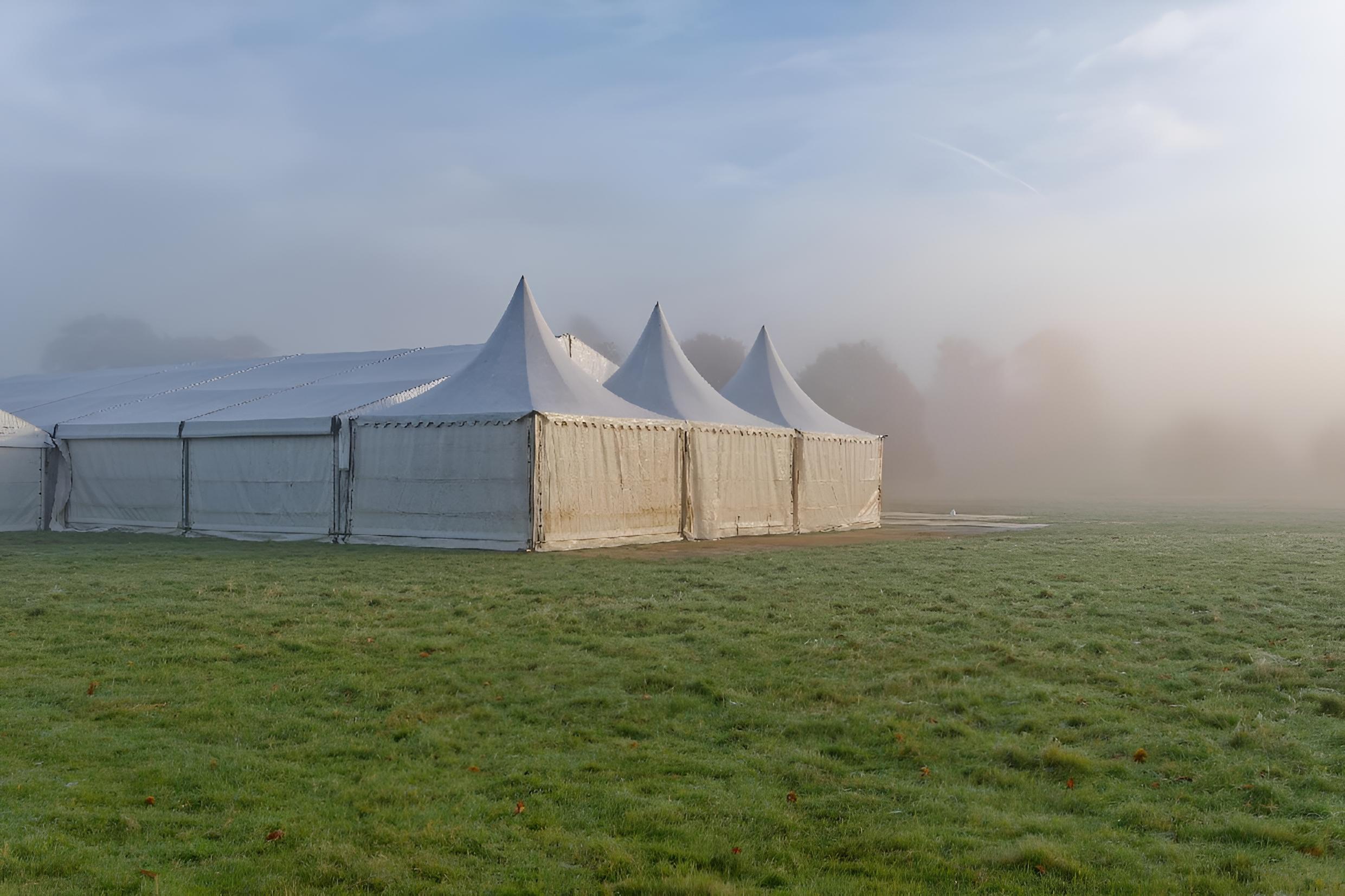 Marquees in the morning mist.