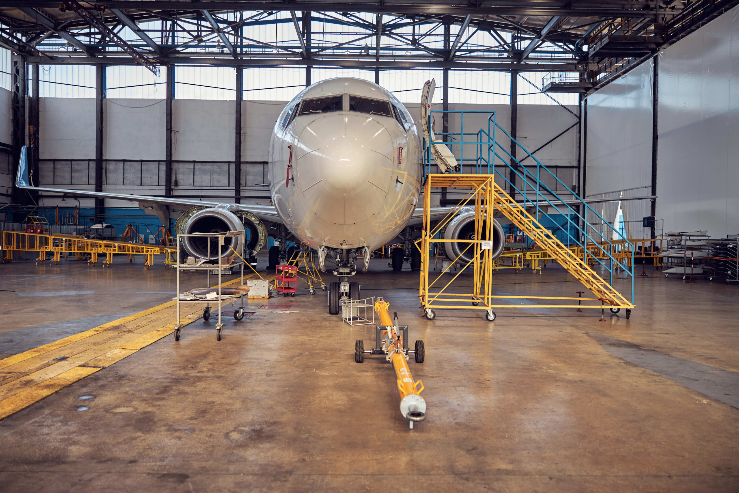 passenger-aircraft-on-service-in-an-aviation-hanga-2024-10-18-09-58-33-utc (1) (1)